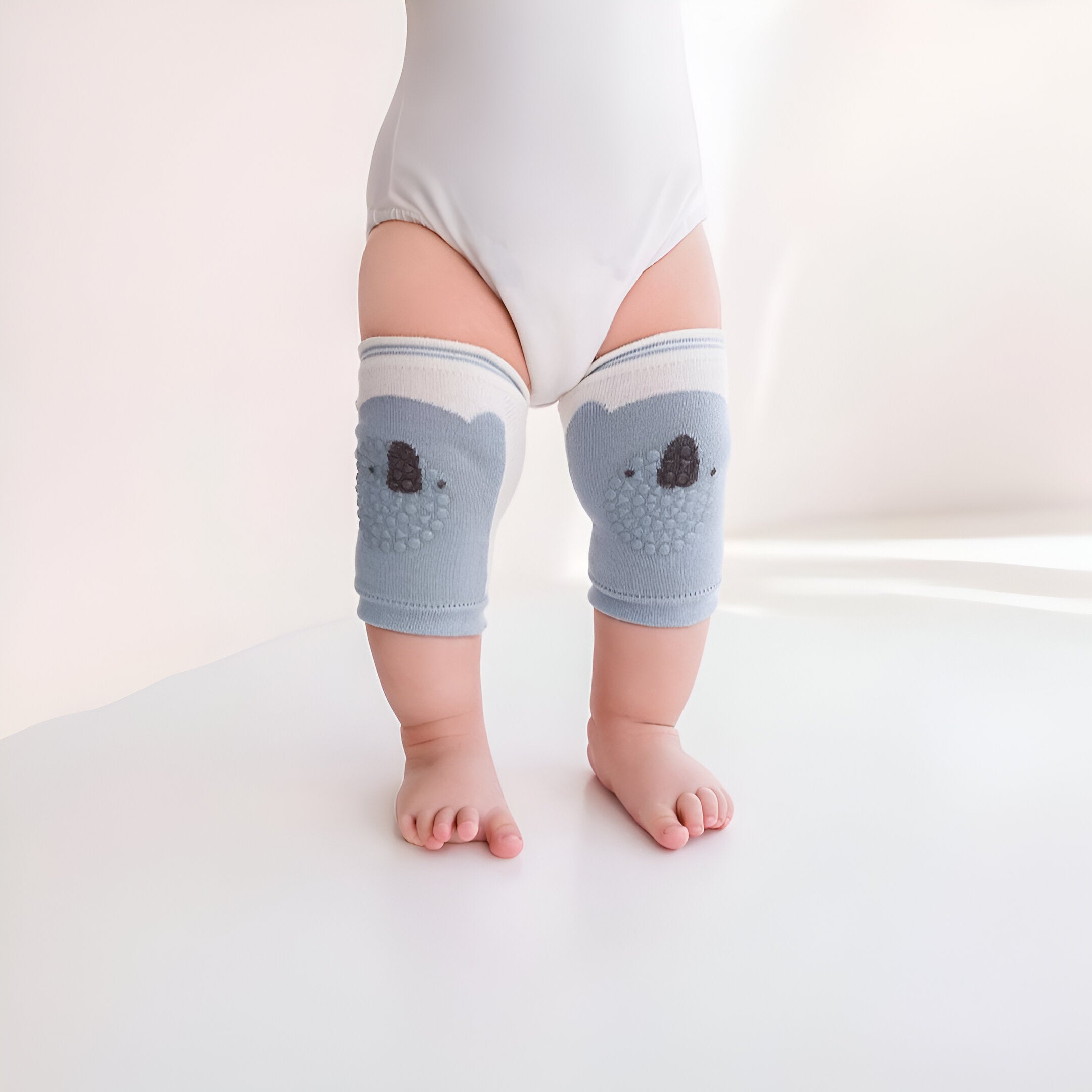Breathable cartoon mesh baby knee pads for crawling toddlers.