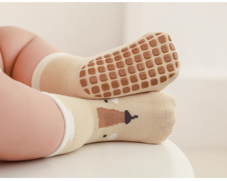 Soft, breathable, non-slip baby floor socks for safe indoor walking and crawling.