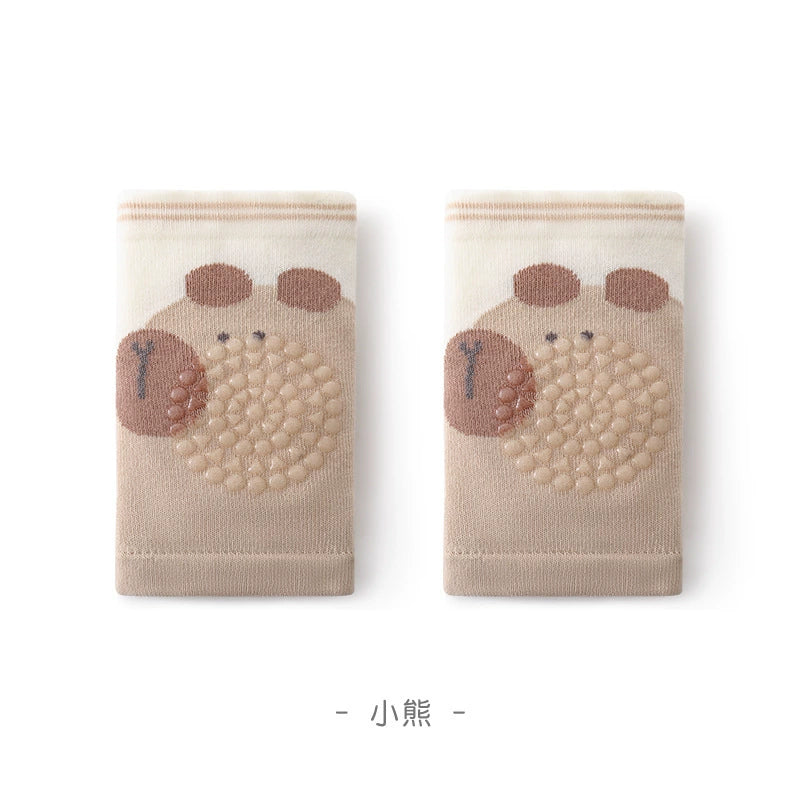 Breathable cartoon mesh baby knee pads for crawling toddlers.