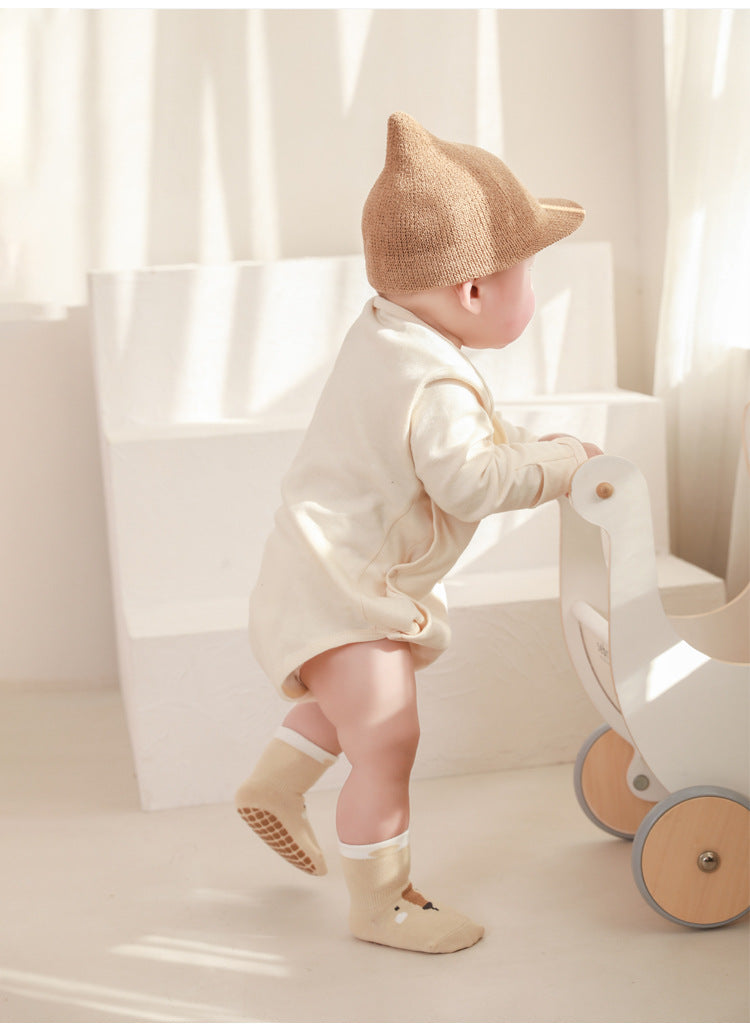Soft, breathable, non-slip baby floor socks for safe indoor walking and crawling.