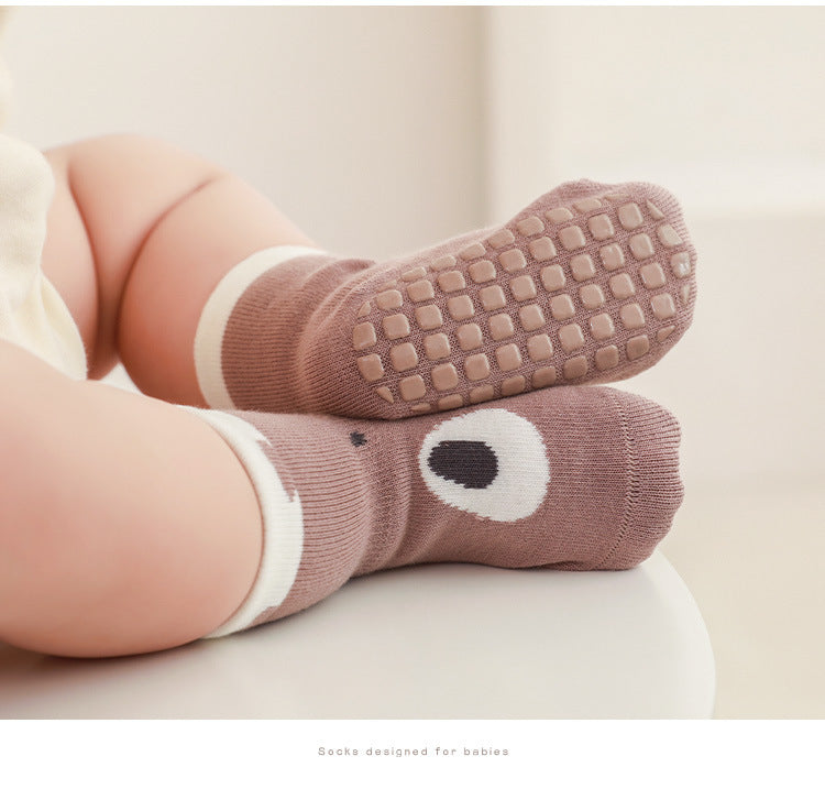 Soft, breathable, non-slip baby floor socks for safe indoor walking and crawling.