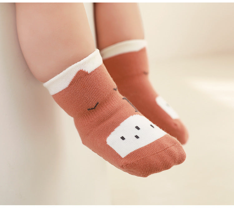 Soft, breathable, non-slip baby floor socks for safe indoor walking and crawling.