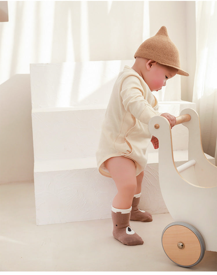 Soft, breathable, non-slip baby floor socks for safe indoor walking and crawling.