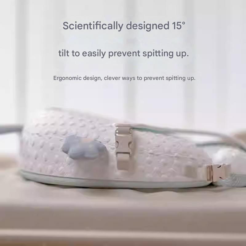 Newborn anti-spit-up pillow for safe feeding and sleep