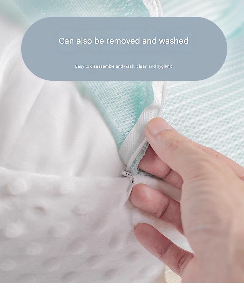 Newborn anti-spit-up pillow for safe feeding and sleep